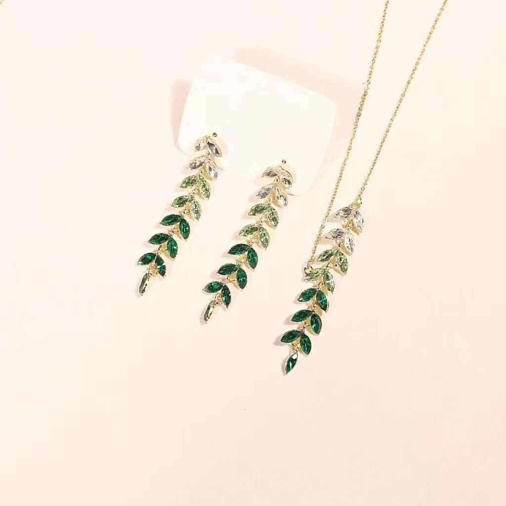 Customized Fashion Jewelry Gold Link Chain Rhinestone Colorful Stones and Leaf Pendant Set Jewelry for Women supplier