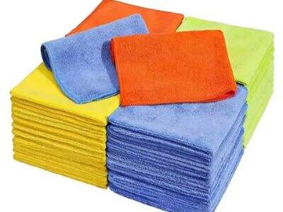 Why do commercial cleaning staff prefer microfiber mop cloths in high-traffic areas?