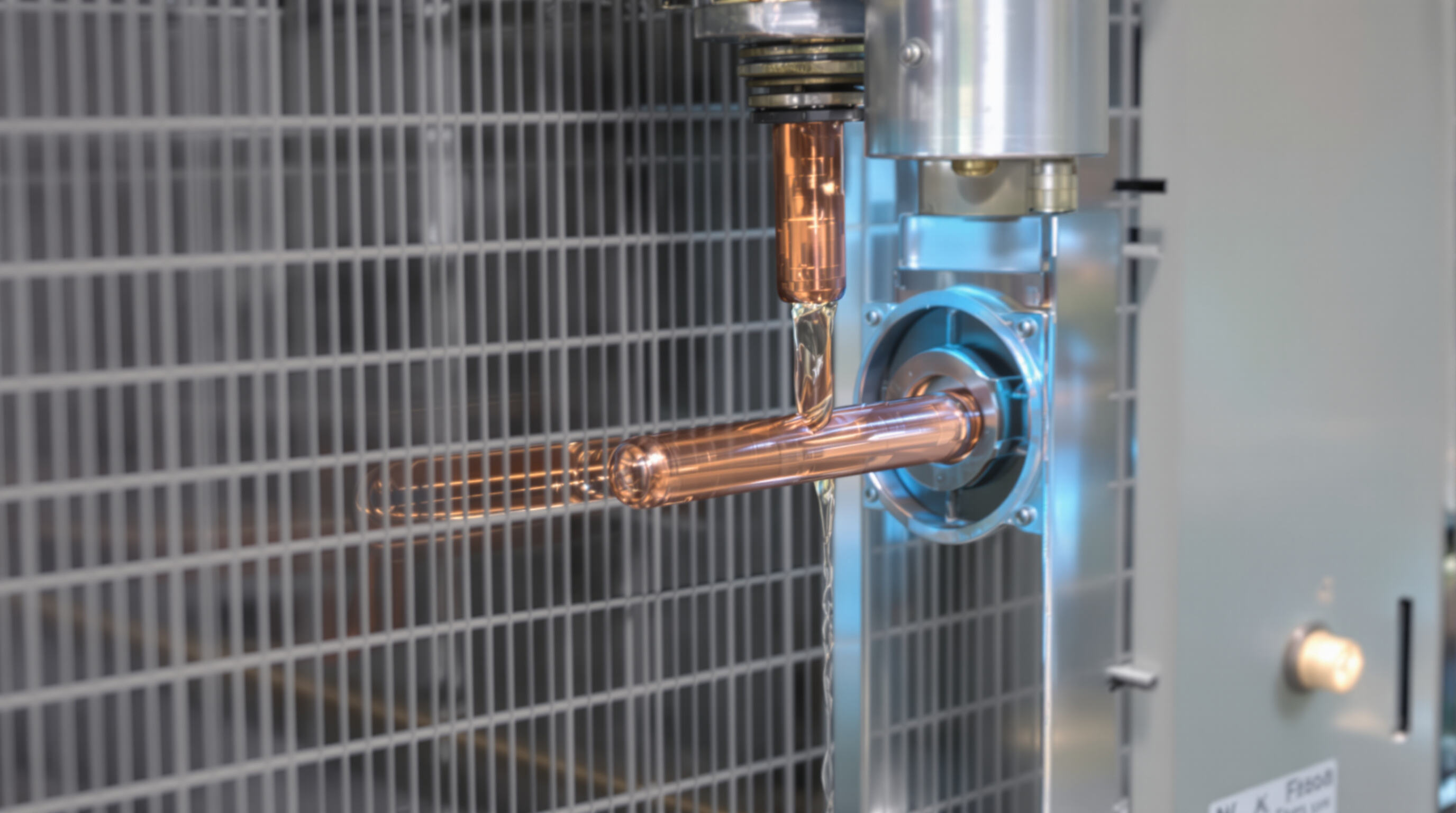 Photorealistic close-up of a capillary tube connecting AC condenser and evaporator, showing refrigerant phase change.