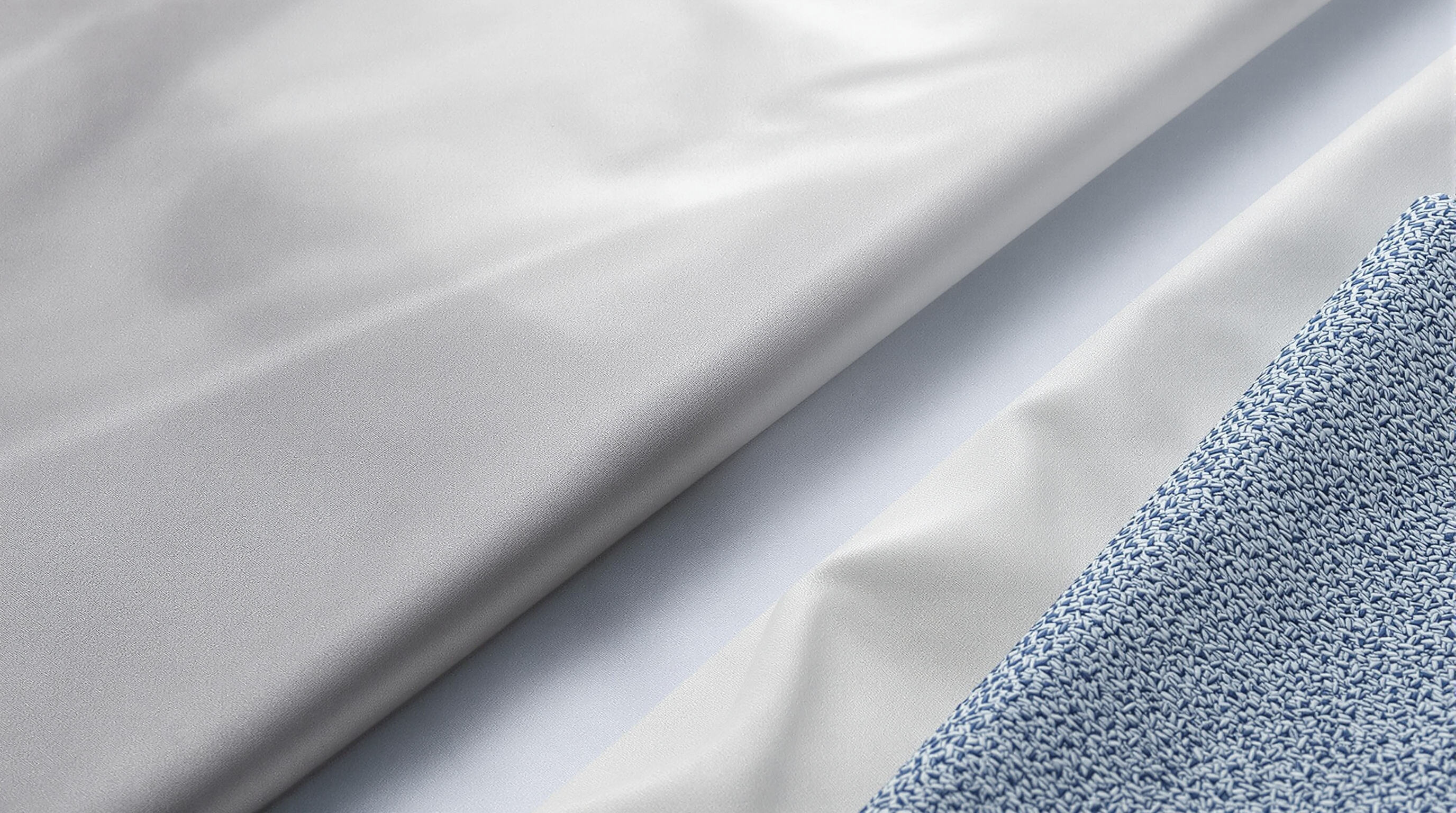 High-quality AC cleaning covers featuring different materials and textures displayed on a tabletop