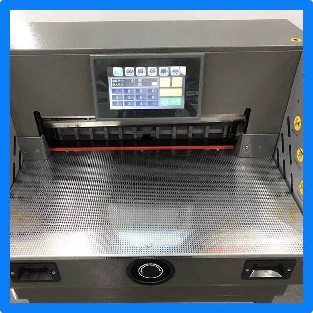 Features a safety guard and blade latch for secure handling.