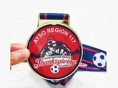 كيفية استخدام الميداليات المخصصة لتحفيز الفرق والاحتفال بالإنجازات