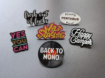 Soft Enamel vs. Hard Enamel Pins: Which One Fits Your Design Best?