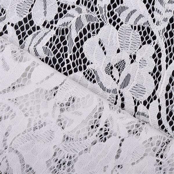 White lace dress fabric never goes out of style