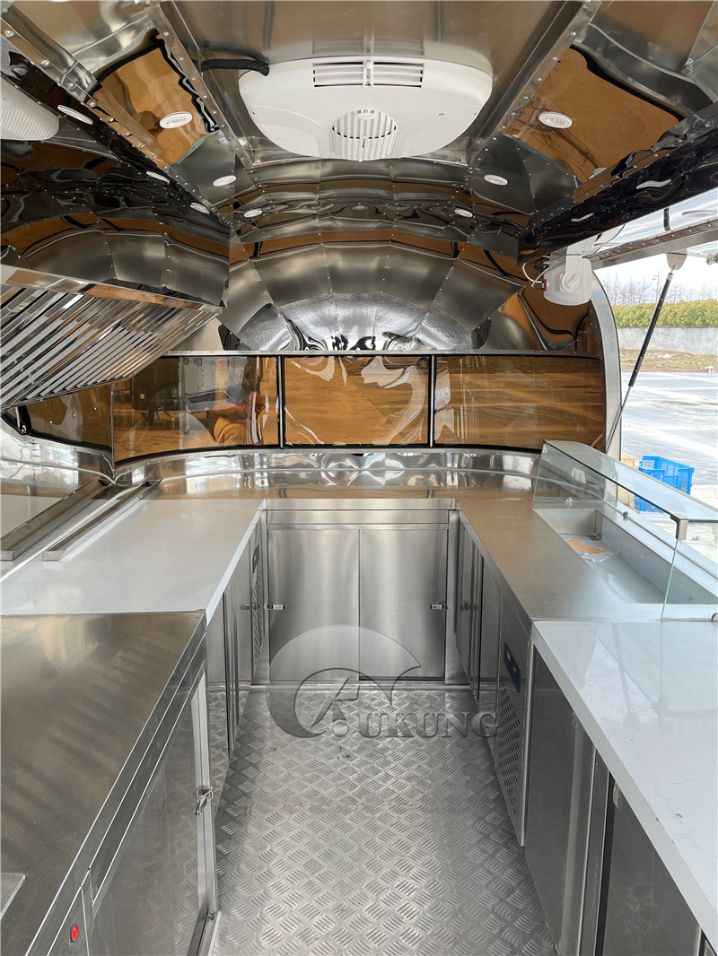 UKUNG vintage airstream style concession food trailer with car painting outside, food trucks equipped with snacks machines details