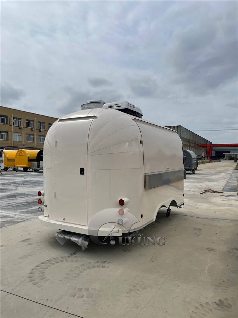 UKUNG vintage airstream style concession food trailer with car painting outside, food trucks equipped with snacks machines details