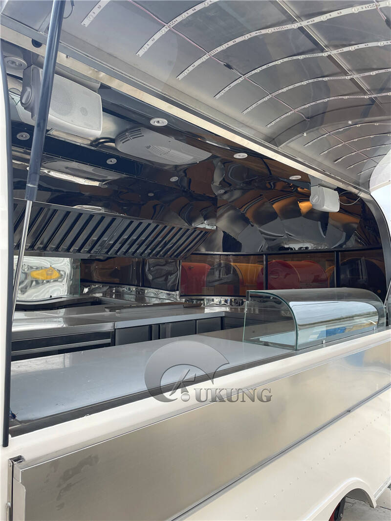 UKUNG vintage airstream style concession food trailer with car painting outside, food trucks equipped with snacks machines factory