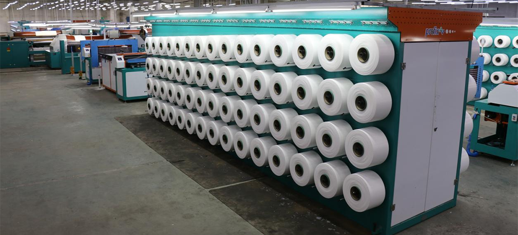 YARN ON SECTIONAL WARPING MACHINE