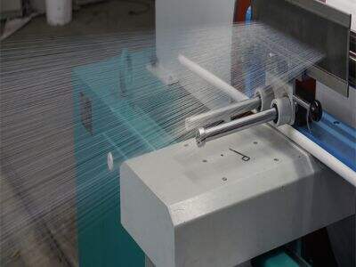 Cum contribuie mașinile de încălcat cu divizare înaltă viteză la creșterea eficienței producției textile?