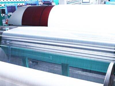 Почему высокоскоростные машины для разделения и перемотки шпуль идеально подходят для крупномасштабного производства текстиля