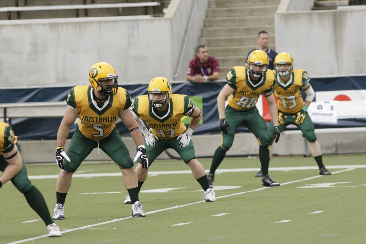 BETHERIVAL Wholesale Children Printed Green Breathable Short Sleeve Football Jersey Black Design American Football Uniform details