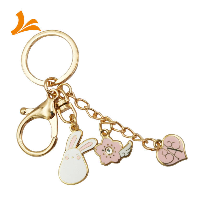 Custom cute pink rabbit gold hard enamel keychain supplier