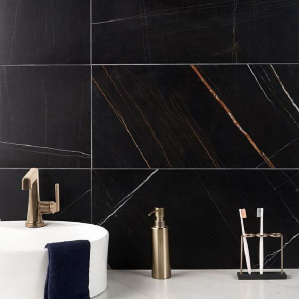 How Black and Gold Tiles Create a Spa-Like Ambiance