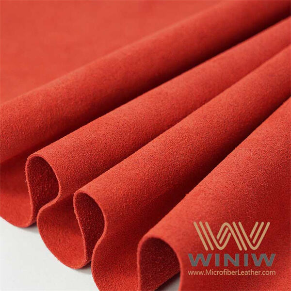 Experience ultimate comfort with cozy red microsuede cushions and pillows.