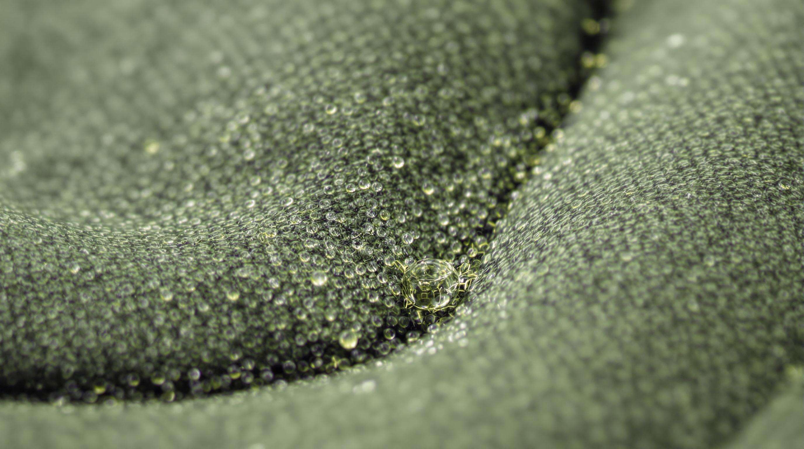 Macro view of self-healing target cloth sealing after arrow impact