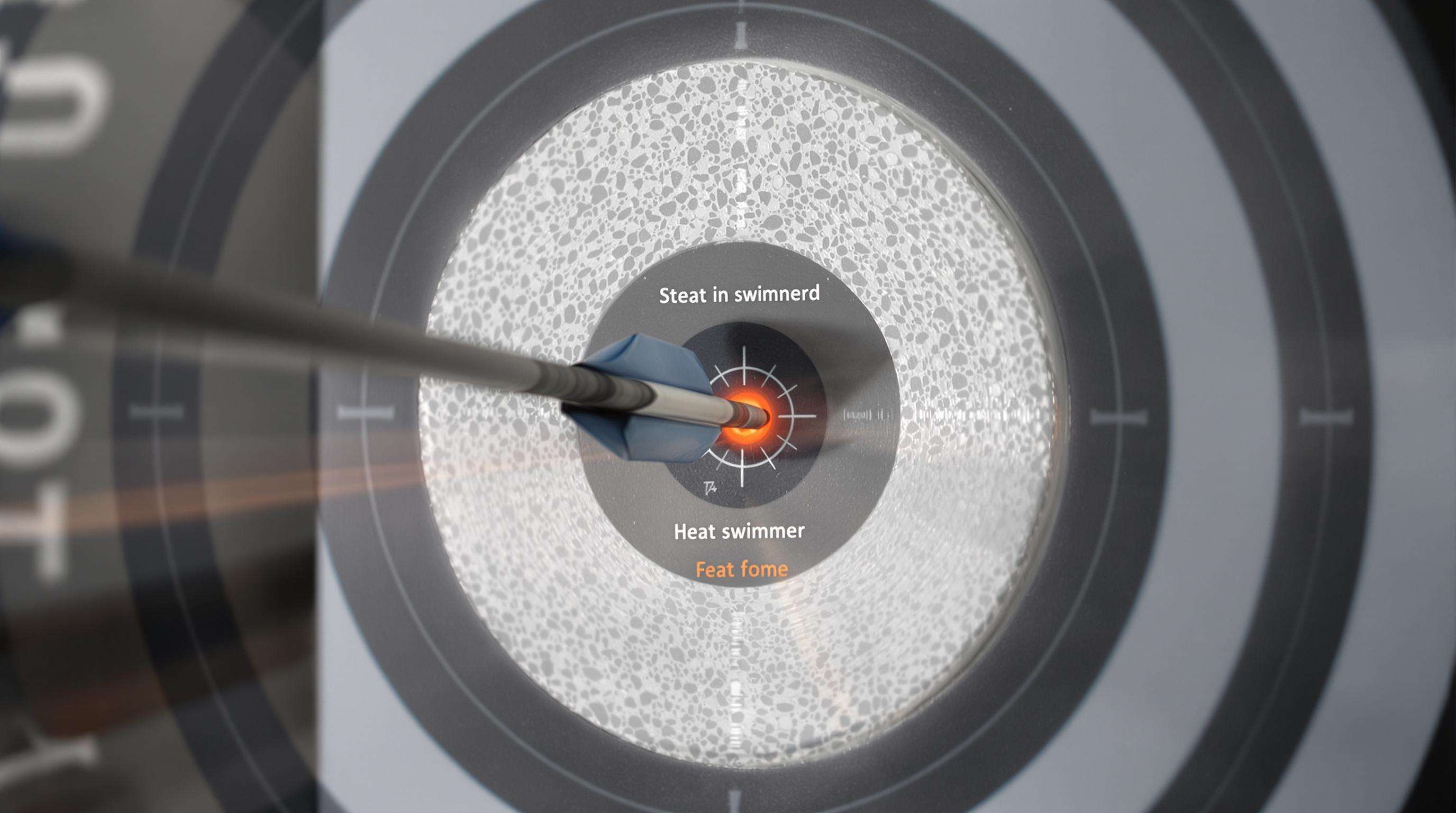 Cross-section of layered foam archery target stopping an arrow to illustrate energy absorption