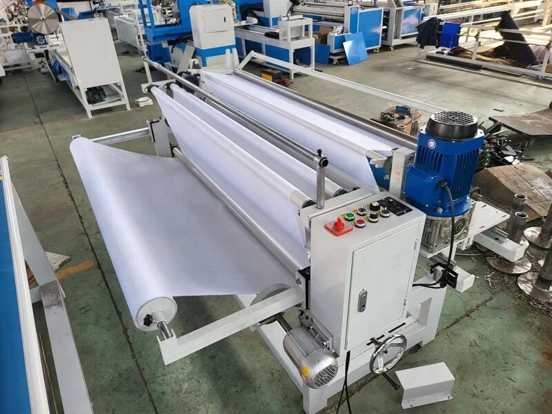 YCJX-1700A  Automatic edge aligning fabric rolling machine details