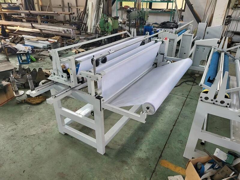 YCJX-1700A  Automatic edge aligning fabric rolling machine factory