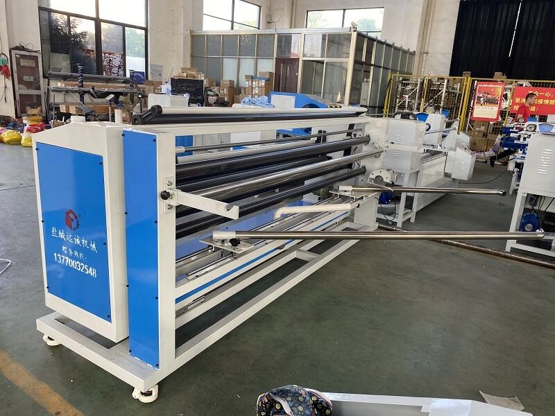 Advanced Automatic Multi-function Fabric rolling Machine manufacture