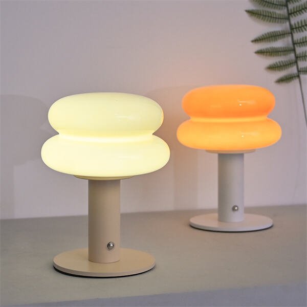 Add a touch of style to your bedside with a sleek and modern rechargeable lamp option.