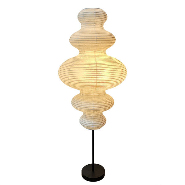 Achieve a cozy ambiance with a tall paper lamp in any corner