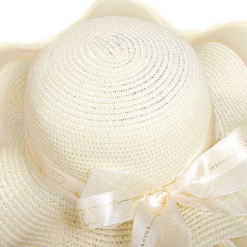 Lace beach hat with large eaves bow