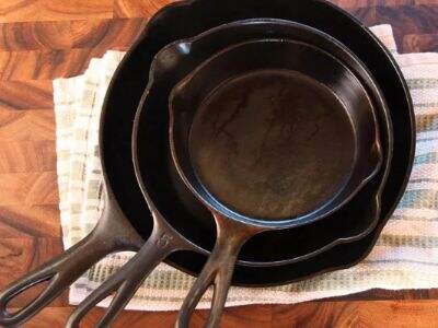 Is cast iron better than stainless steel?