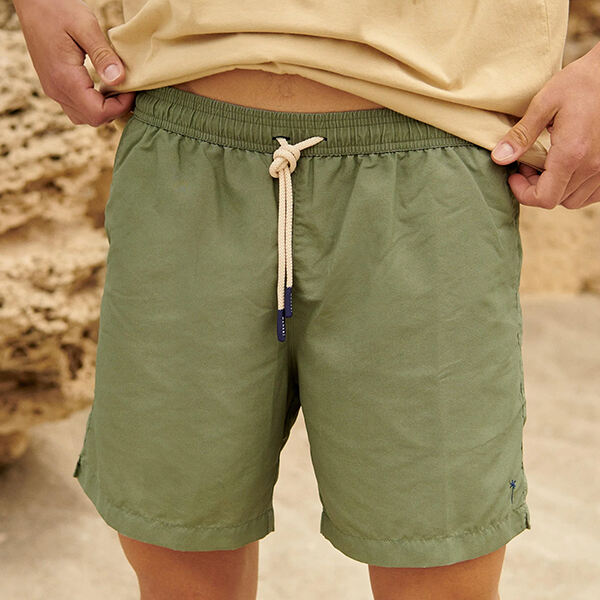 Safety and Comfort in Green Swim Trunks
