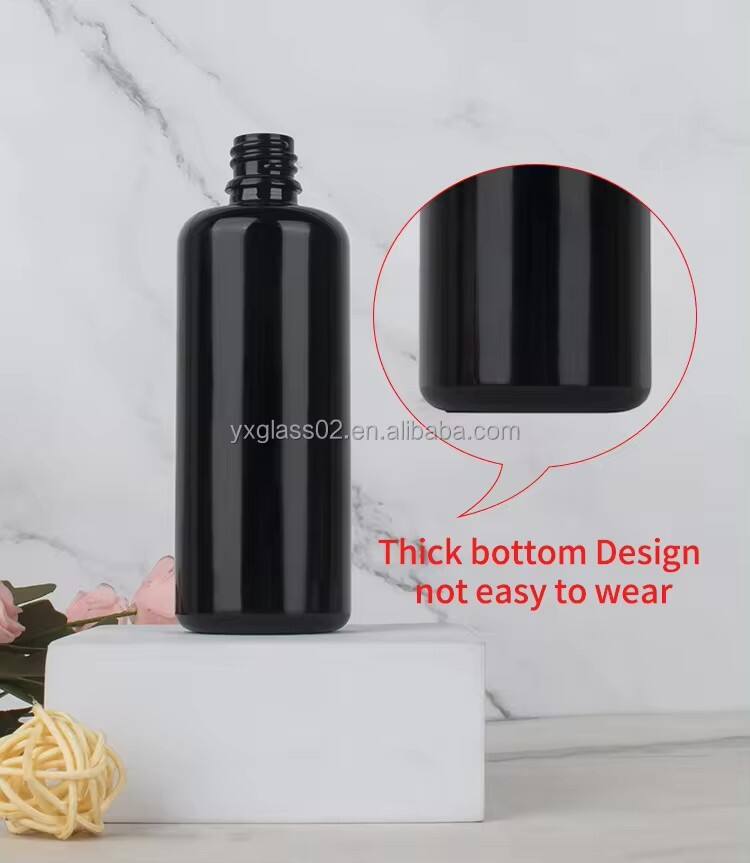 Custom 10ml/15ml/30ml/50ml/100ml/200ml black Essential Oil Packaging Bottles Glass Bottle Dropper glass Bottle wholesale manufacture