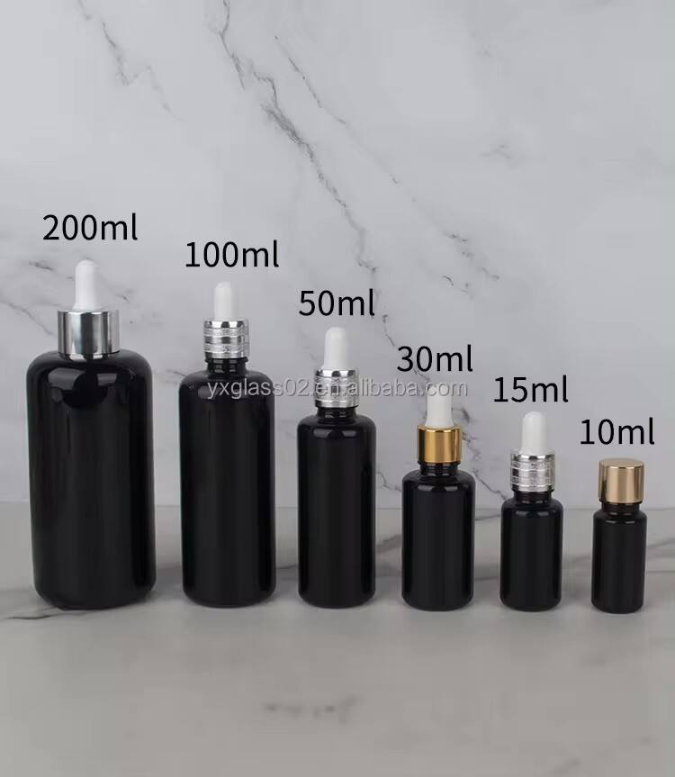 Custom 10ml/15ml/30ml/50ml/100ml/200ml black Essential Oil Packaging Bottles Glass Bottle Dropper glass Bottle wholesale supplier