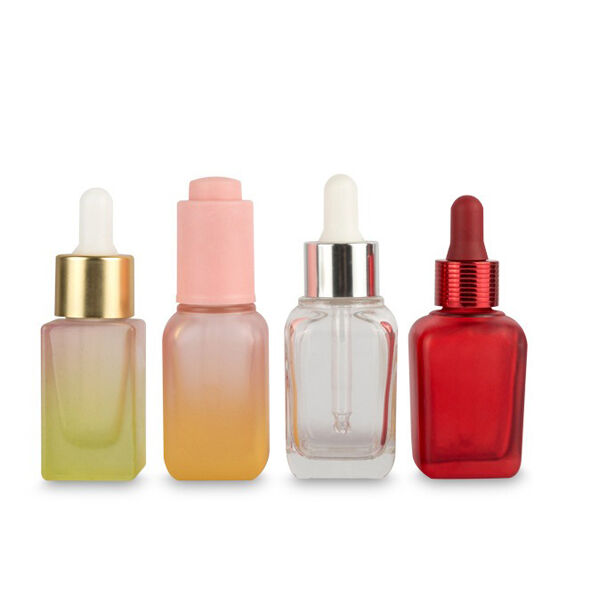 Application pratique de l'huile avec des bouteilles à compte-gouttes