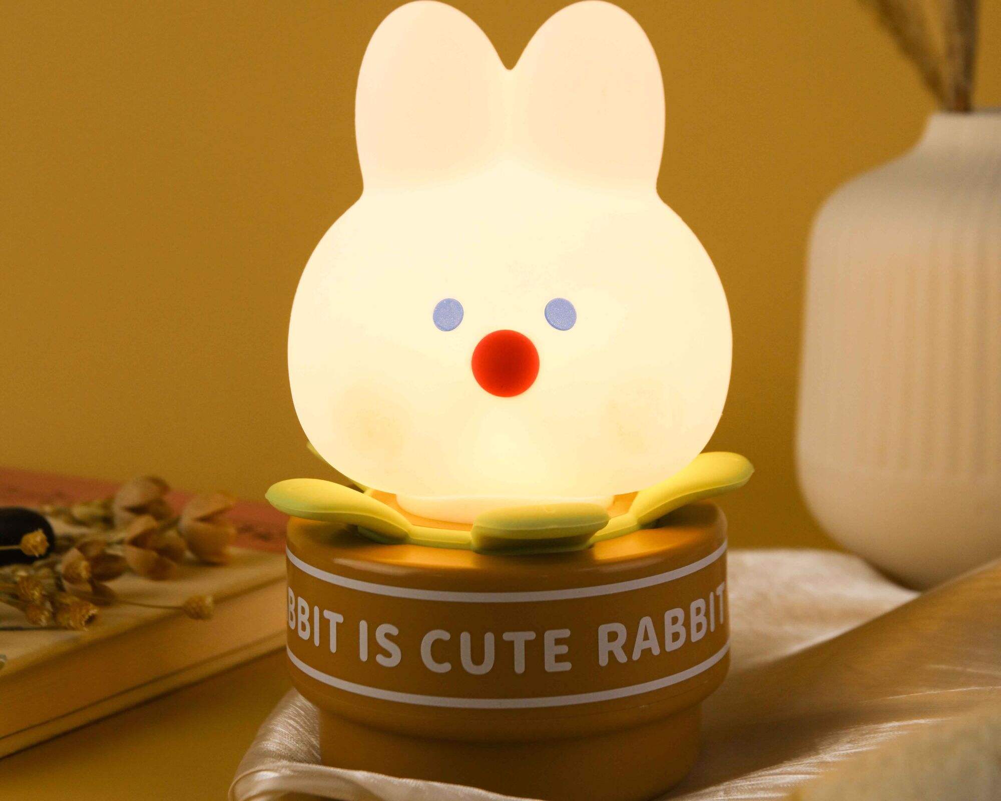 Brighten up your evenings with the whimsical Potted Rabbit Silicone Night Light.  Infuse your bedroom with charm and character, creating a cozy and enchanting atmosphere in your space