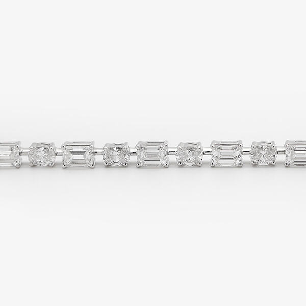 Elevate your accessory game with the dazzling lab tennis bracelet.