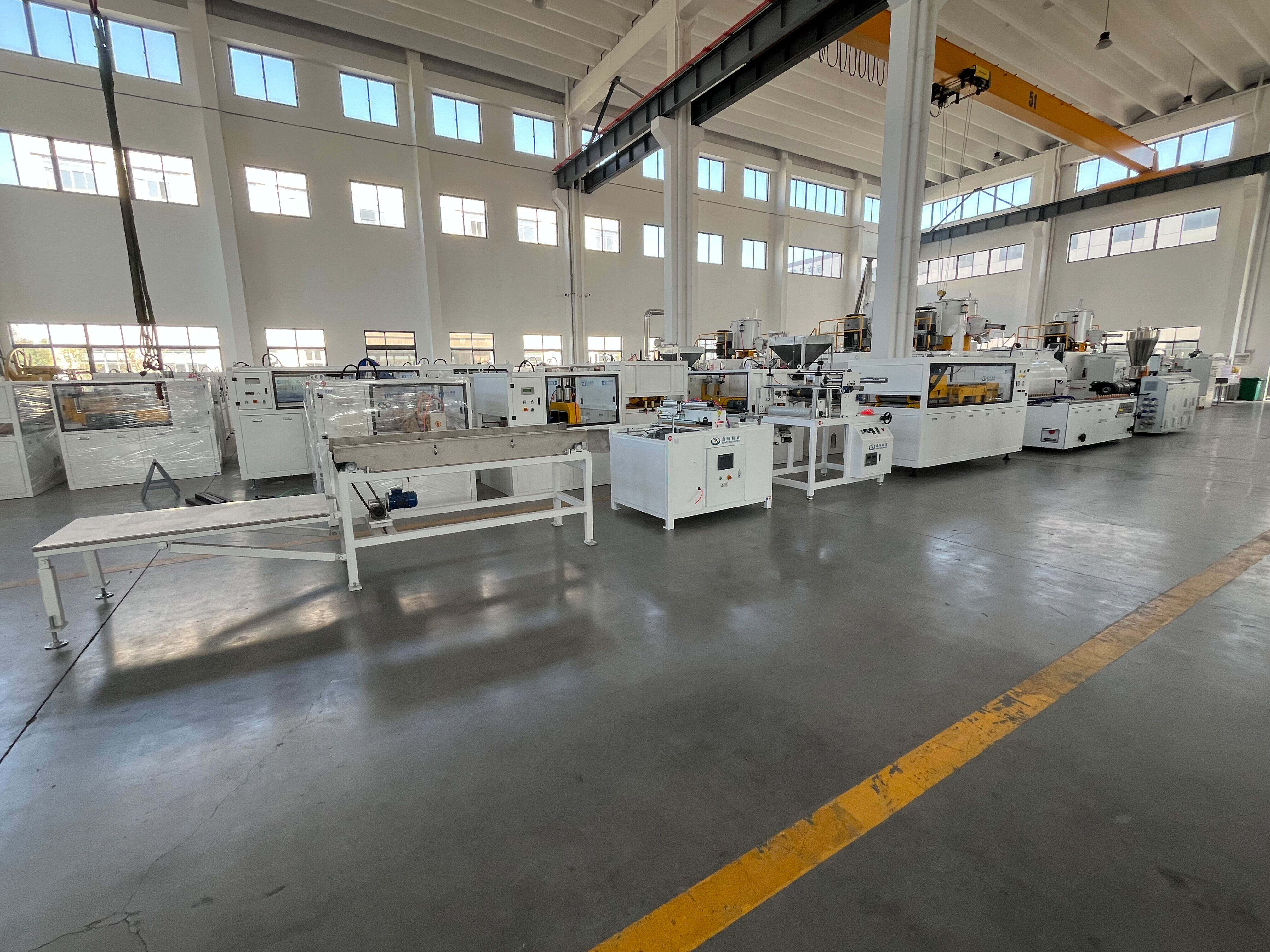 How does Xinhe Machinery's PVC ceiling production line achieve a speed exceeding 9m/min?