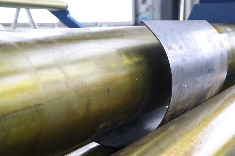 What is the working principle of the automatic plate rolling machine of CNC four-roll plate rolling machine?