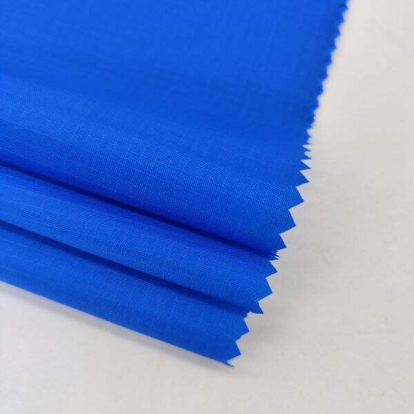 Sleek and stylish, waterproof nylon fabric is as practical as it is fashionable.