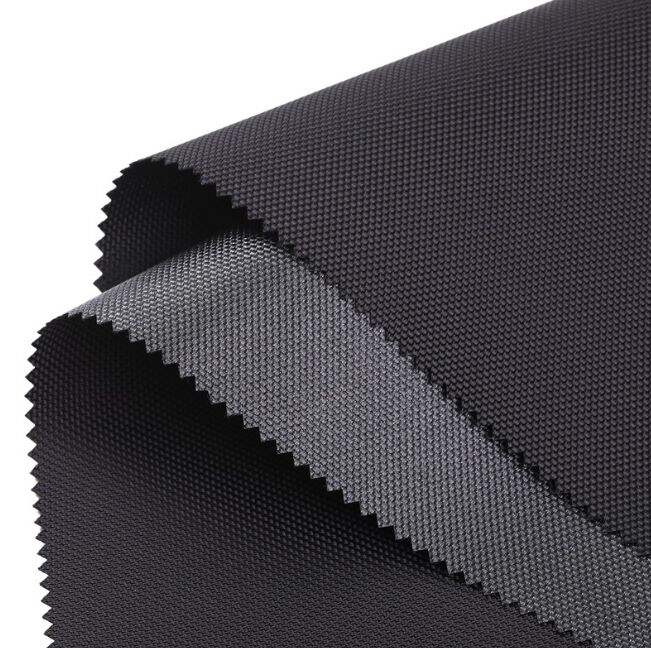 วัสดุไนลอนแบบหนักพิเศษเปรียบเทียบกับผ้าชนิดอื่นอย่างไรในแง่คุณภาพ