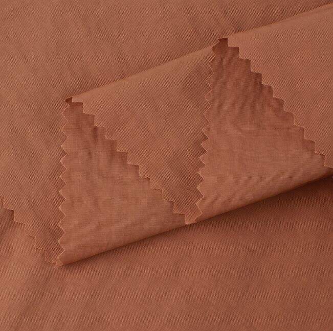 ¿Cuáles son los problemas comunes con el tejido Nylon Taslan y cómo evitarlos?