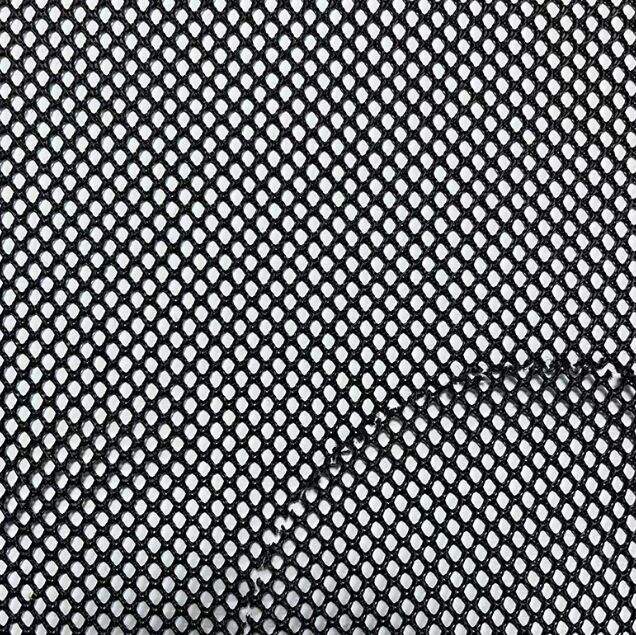 What makes black mesh cloth a must-have for fashion designers