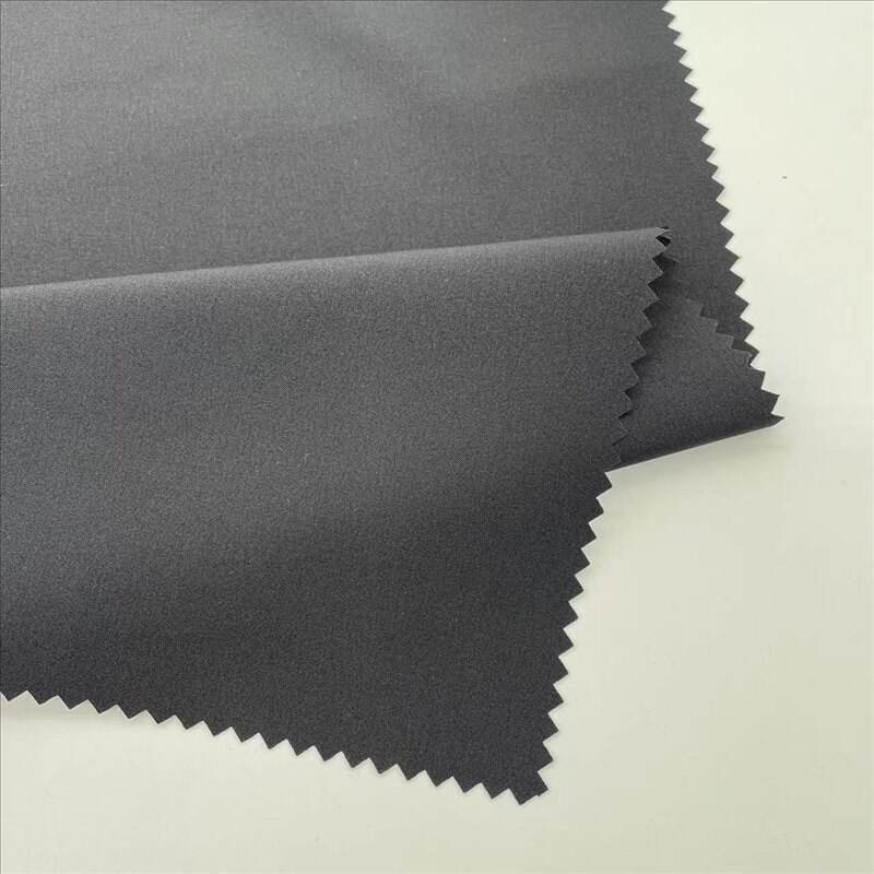Polyester woven 4 way stretch fabric with DWR finishing