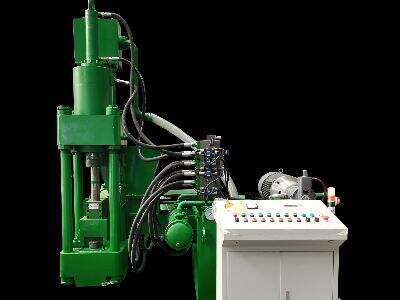 Crush and compact with scrap metal baler machine