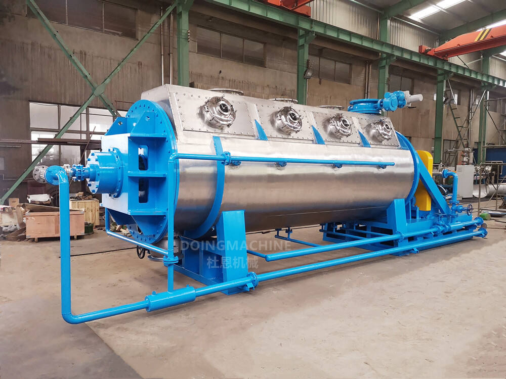 Low temperature heat pump vacuum paddle dryer for sludge manufacture