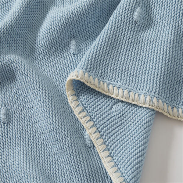 Add a touch of handmade charm with a knitted pram blanket.