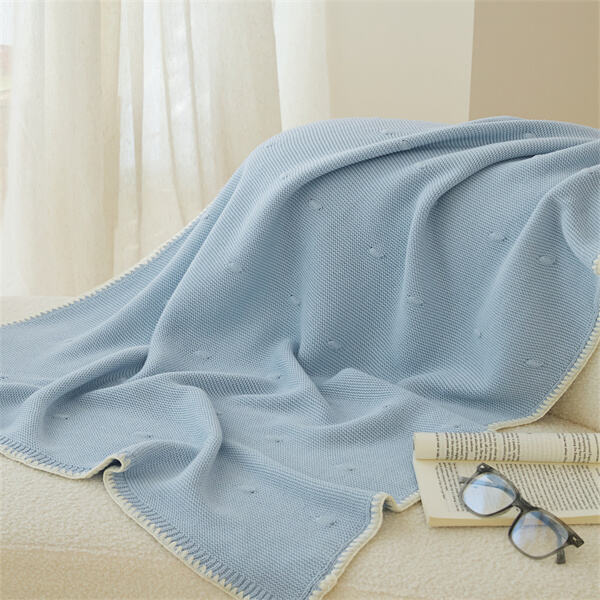 Create a timeless keepsake with a beautifully crafted knitted pram blanket.