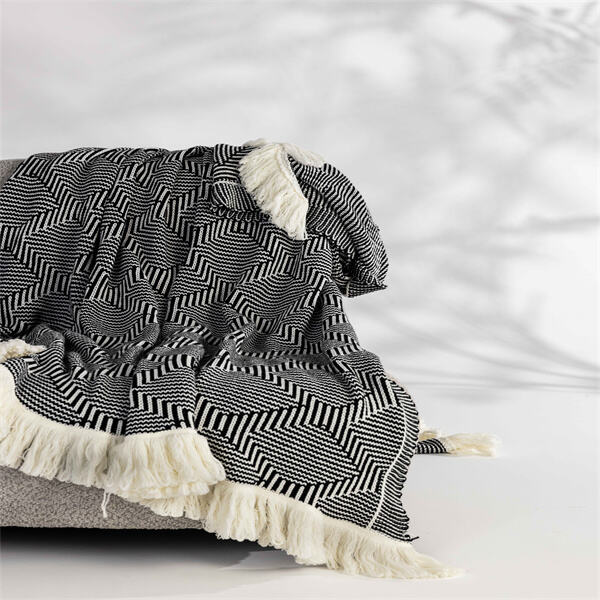 Make a statement with a bold black and white checkered throw.