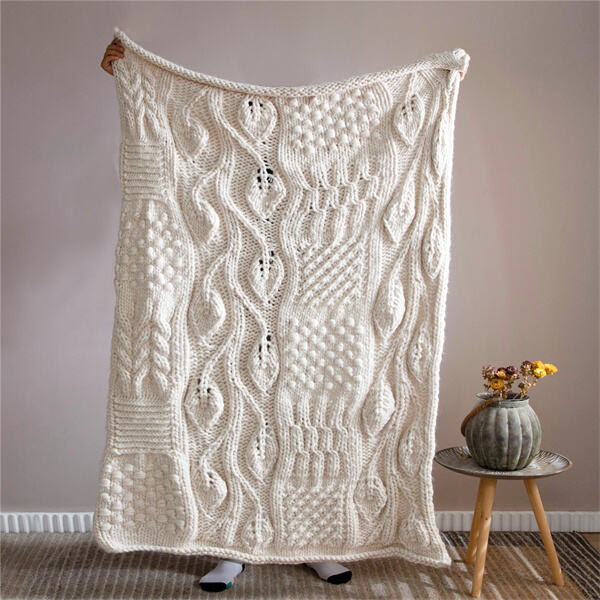 Experience the luxury of a one-of-a-kind handmade chunky knit blanket.