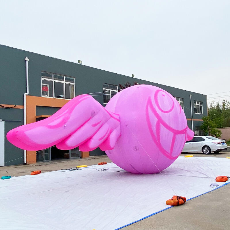 Inflatable pink wing helium balloon