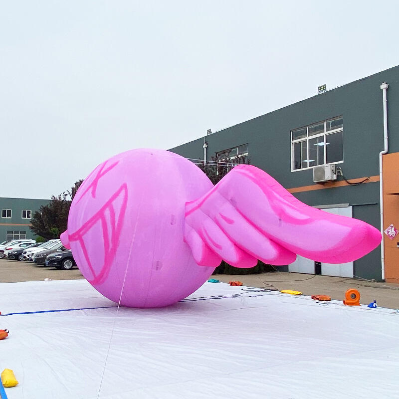 Inflatable pink wing helium balloon