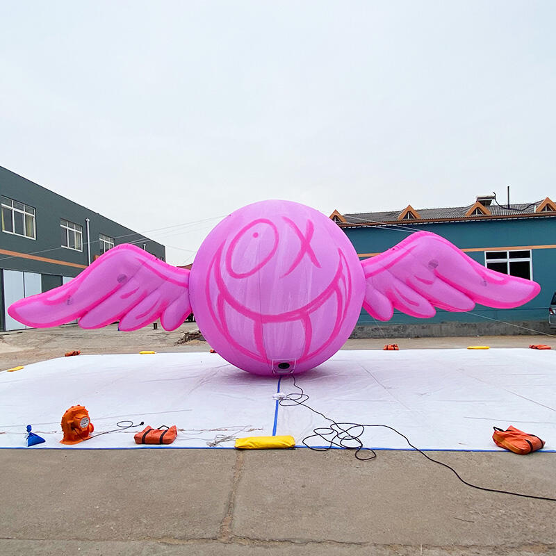 Inflatable pink wing helium balloon