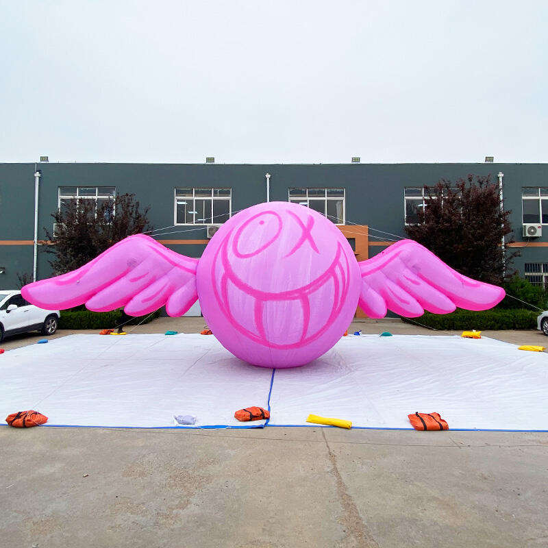 Inflatable pink wing helium balloon